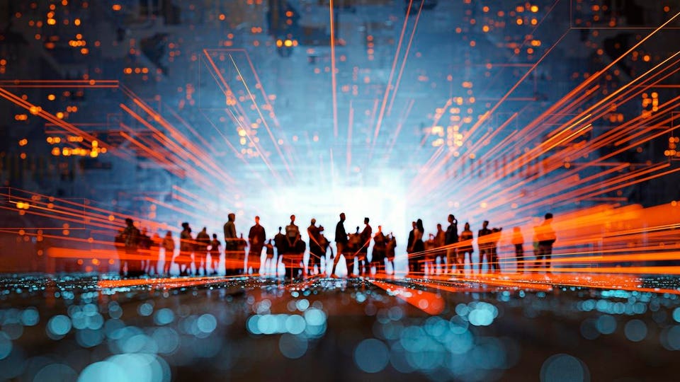 A group of silhouetted people stands before a glowing light in a futuristic digital landscape