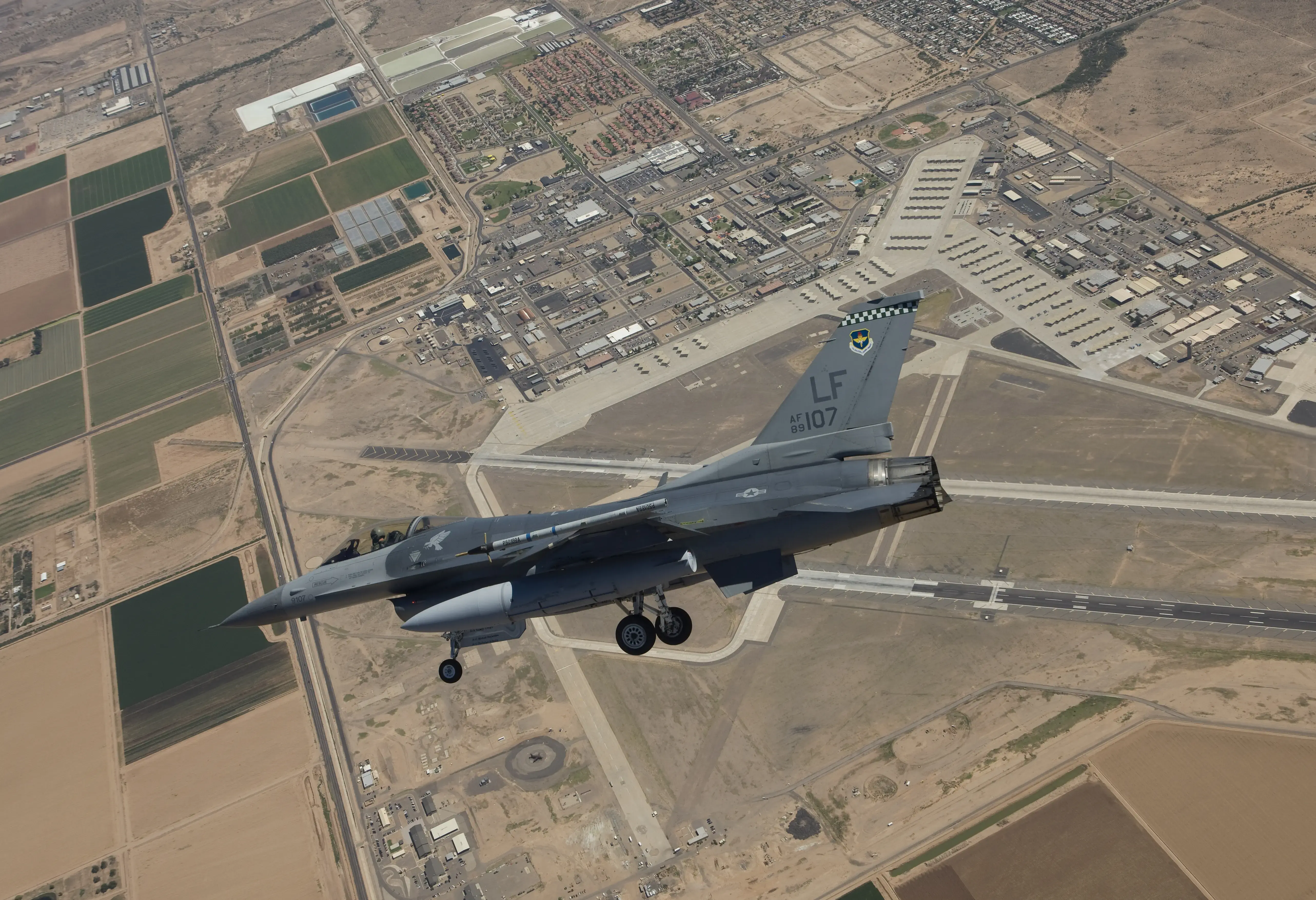 An F-16 Fighting Falcon from the 56th Fighter Wing at Luke Air Force Base, Arizona, performs an SFO during a training mission.